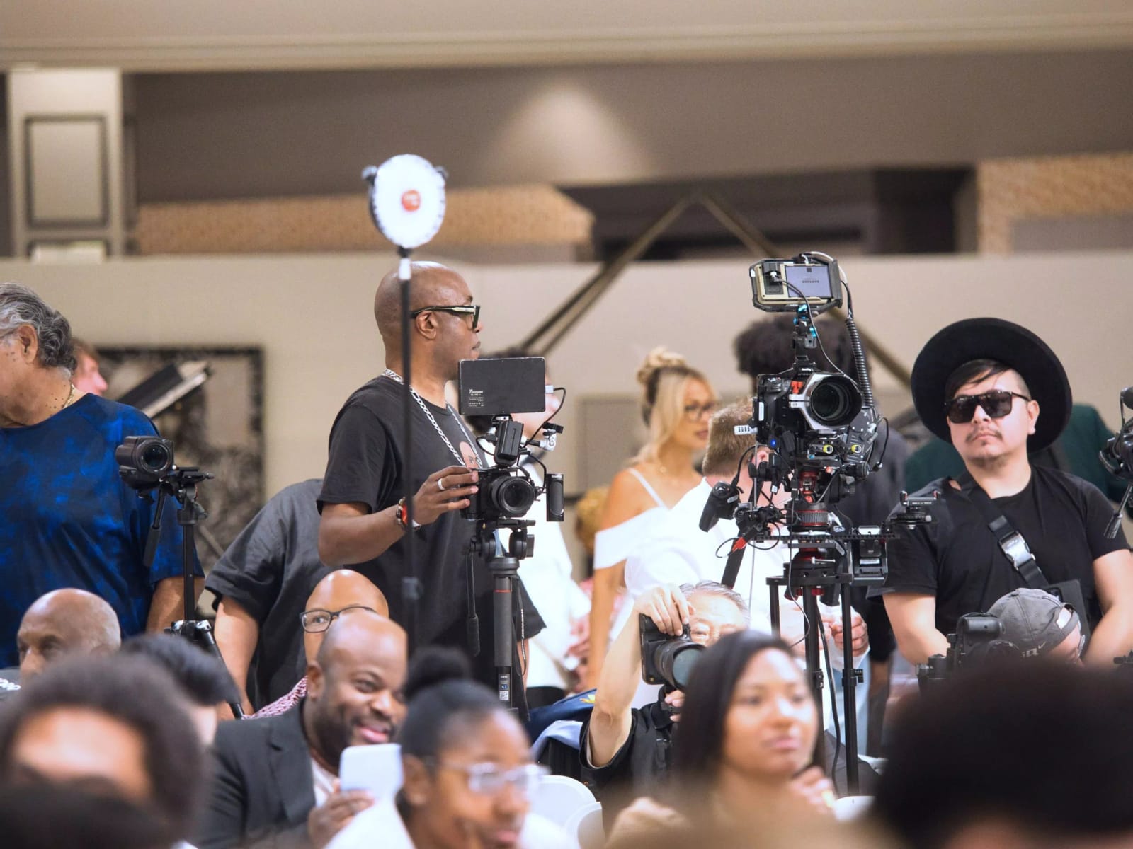 Production crew filming a live event